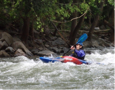 A group of people riding skis on a body of water

Description automatically generated